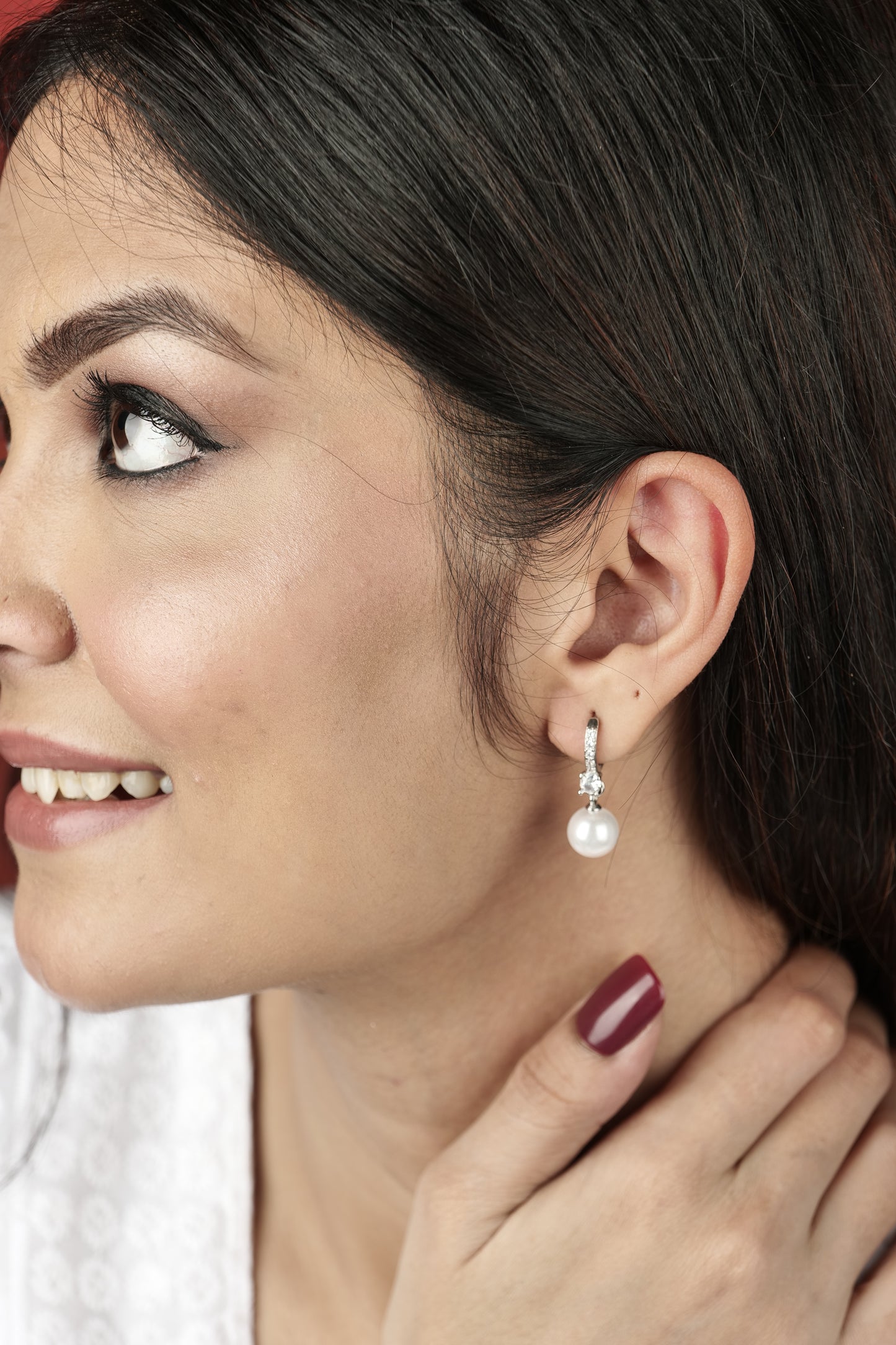 PEARL AND AMERICAN DIAMOND STUDDED EARRINGS