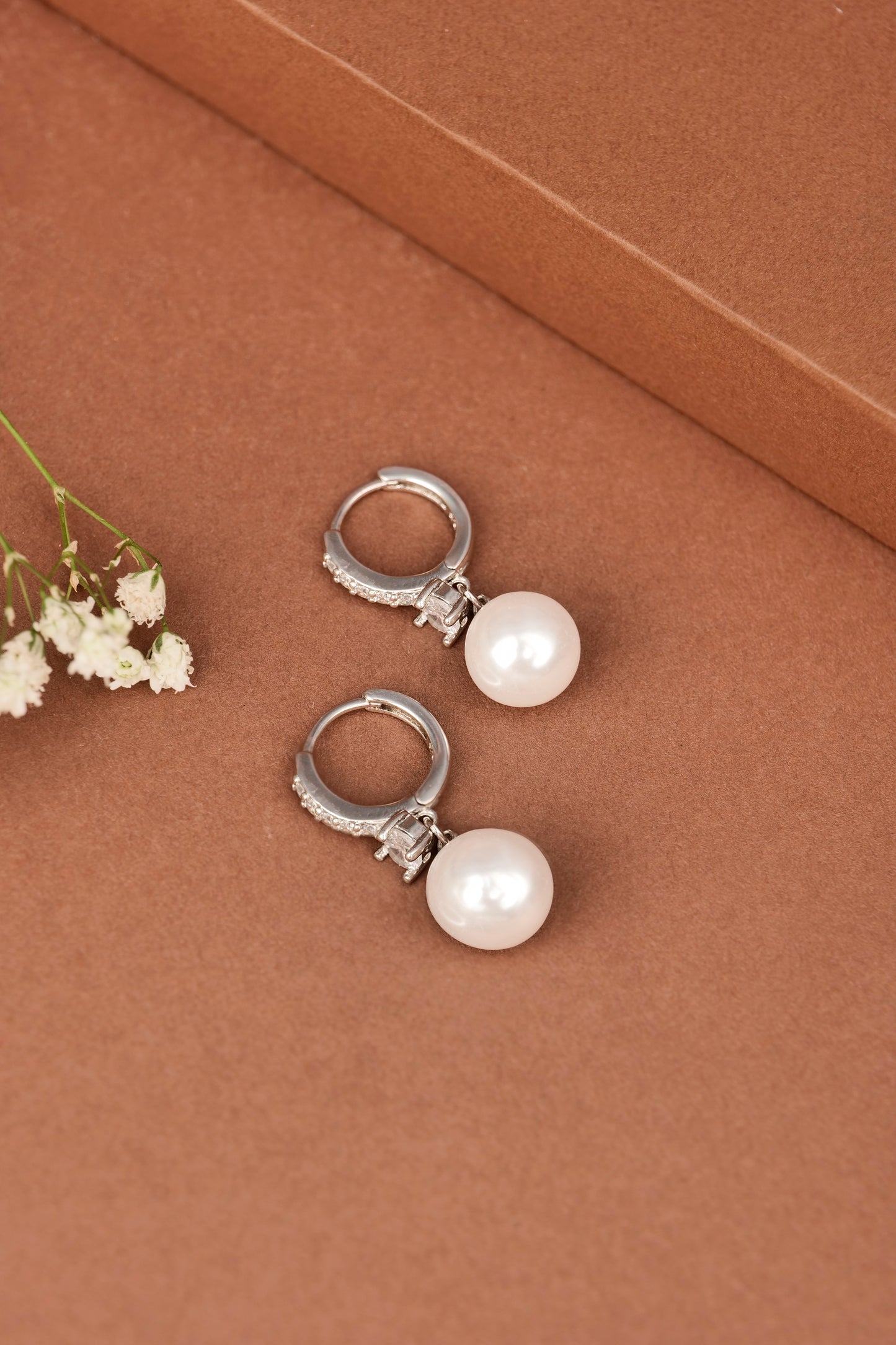 PEARL AND AMERICAN DIAMOND STUDDED EARRINGS