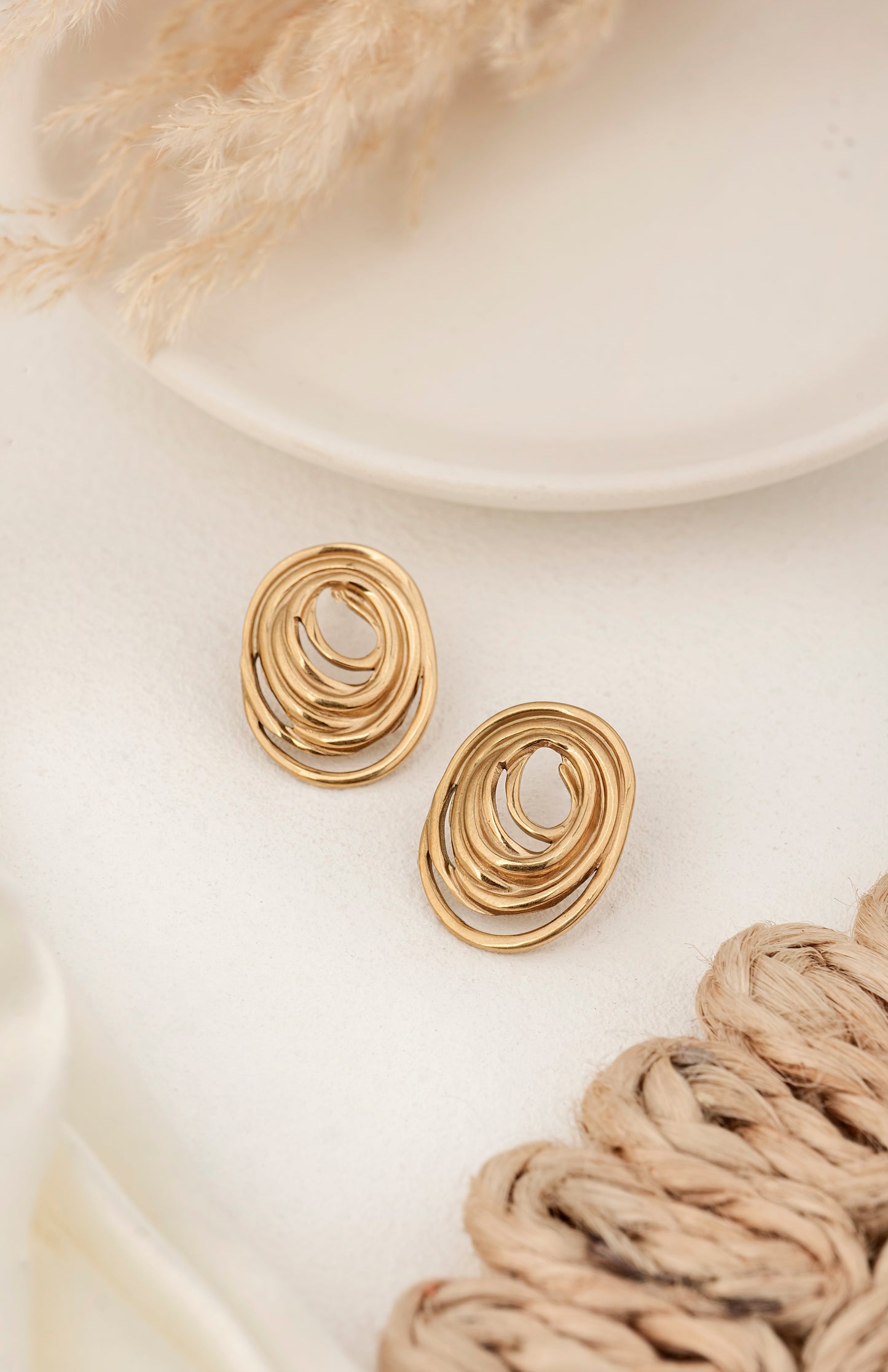 GOLDEN SWIRL STUDS